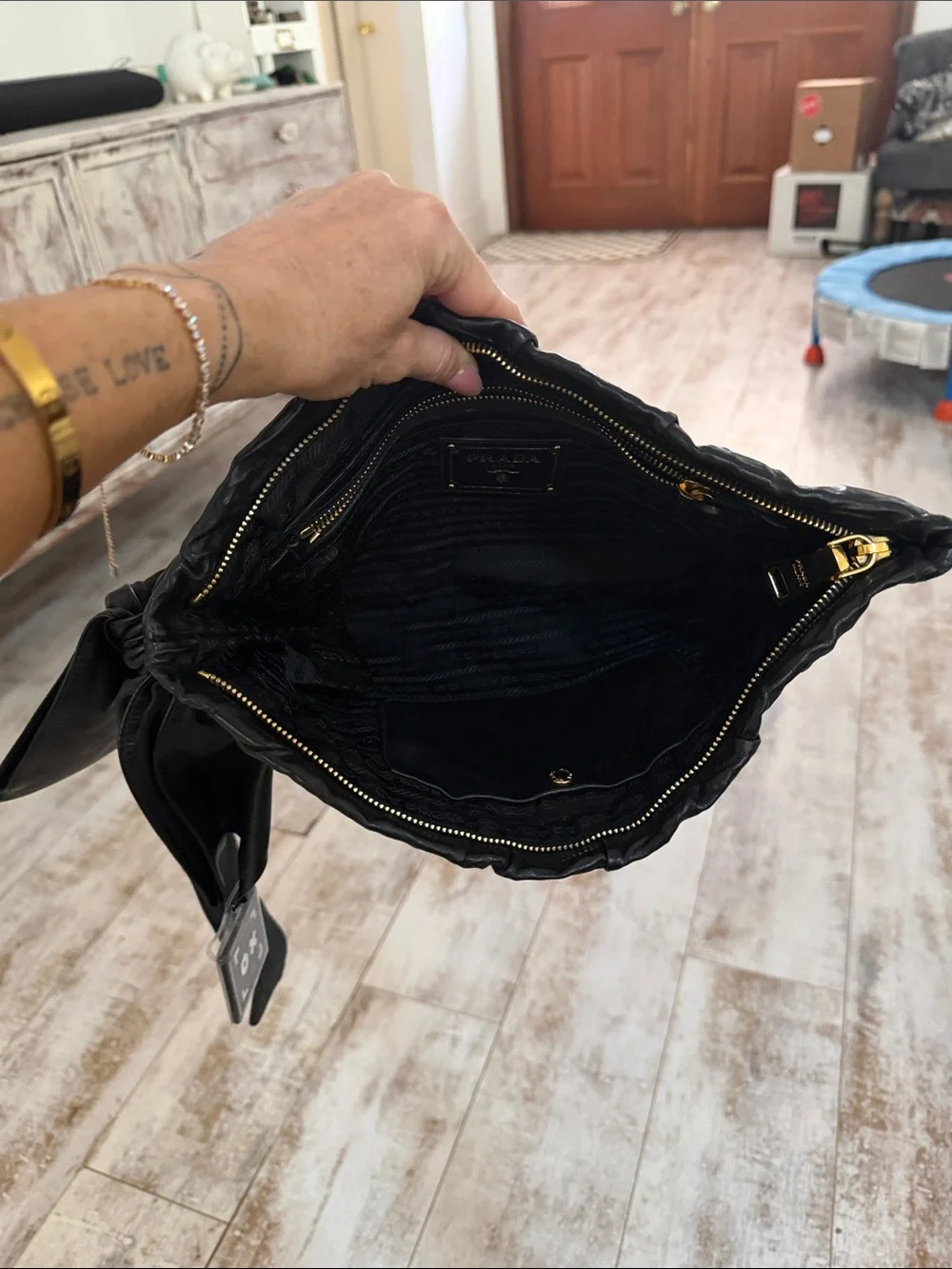 Prada Black Gathered Leather Clutch with Gold Logo Accent